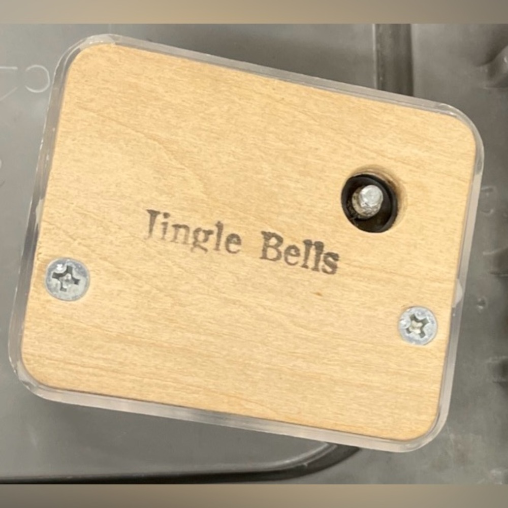 Music Box Mechanism that plays Jingle Bells in a Hard Case Key Not Included